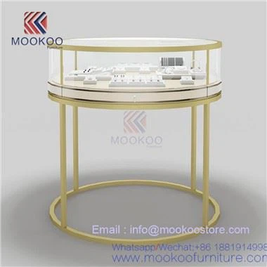 Rund messing utstillingsvindu for Cartier